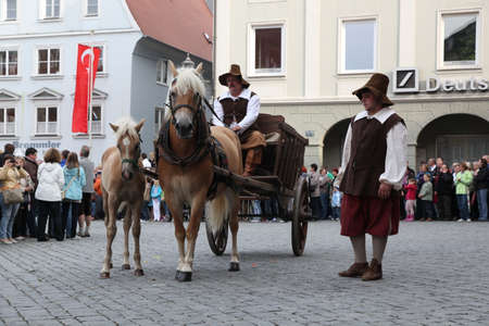 Memmingen, Bavaria / Germany - July 23 2011: Traditional parade taking place at festival "Fischertag" in Memmingen - people are dressed up in medieval costumesのeditorial素材