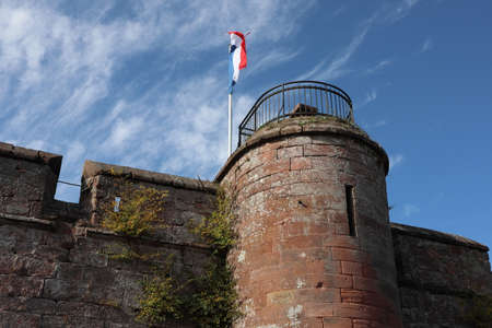 Lichtenberg, Region Grand Est / France - October 12 2019: French flag at castle Lichtenberg, Alsace, Franceのeditorial素材