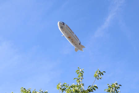 Bregenz, / Austria - August 09 2019: Zeppelin NT flying over Bregenz in Austria at Lake Constanceのeditorial素材
