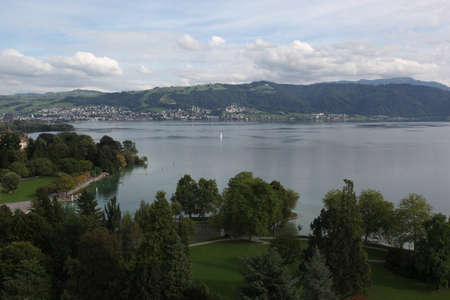Cham, Kanton Zug (ZG) / Switzerland - September 14 2013: View on lake Zug in town Cham, nice park...