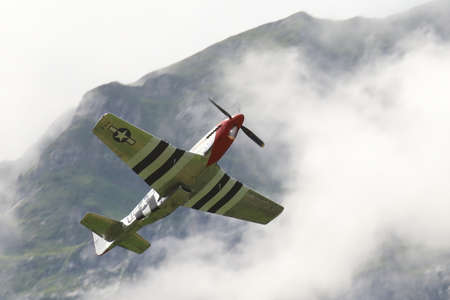 Mollis, Kanton Glarus (GL) / Switzerland - August 16 2019: Historic Aircraft Warbird North American P-51D Mustangのeditorial素材