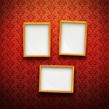 Three Picture frames in gold on red vintage backgroundの写真素材