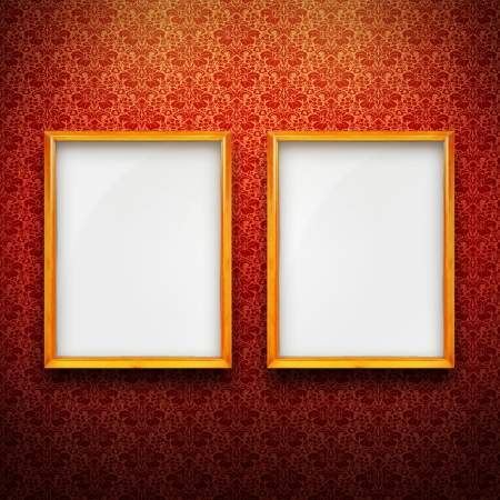 Empty golden frames with red vintage wallpaperの写真素材