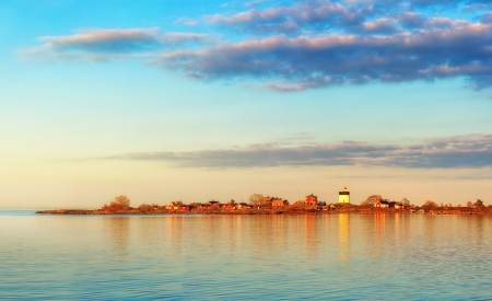 Lighthouse in sunset, Svartklubben in Grisslehamn, Swedenの写真素材