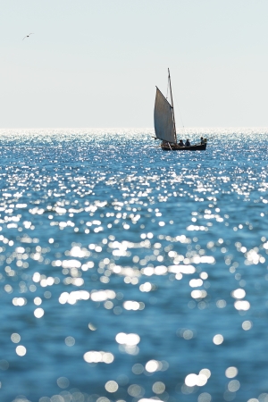 Lonely postal rowing boat between Grisslehamn  Sweden  and EckerÃ¶  Ãland  in sunny weatherの写真素材