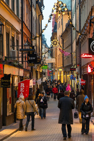 STOCKHOLM - DEC, 19  The long Vasterlanggatan the central shopping street of Gamla Stan on December 19, 2013 in Stockholm  Gamla Stan is the well-preserved old town centre of Stockholm  のeditorial素材