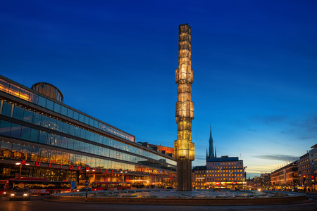 STOCKHOLM - MARCH 18  Night view of Sergels Torg with the glass obelisk Kristallvertikalaccent  March 18, 2014 in Stockholm, Sweden  The obelisk by sculptor Edvin Ohrstrom was completed in 1974 のeditorial素材