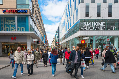 STOCKHOLM - MAY 27: The shopping street Drottningatan during day. May 27, 2014 in Stockholm, Sweden. Drottningatan is one of the most famous shopping streets in Stockholm.のeditorial素材