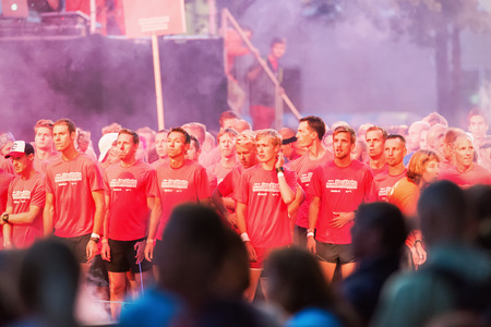 STOCKHOLM - AUG, 16: Nervous runners at the start of the Midnight Run (Midnattsloppet) event. Aug 16, 2014 in Stockholm, Swedenのeditorial素材