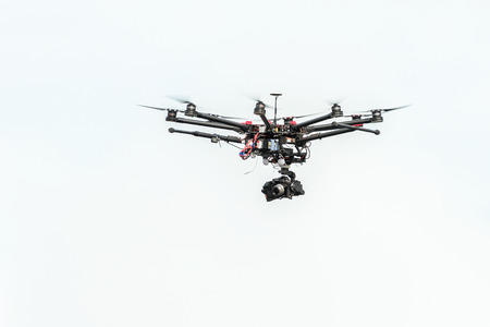 STOCKHOLM - AUG, 23: Professional hexacopter drone for live television at Mens ITU World Triathlon Series event August 23, 2014 in Stockholm, Sweden. Alistair Brownlee got the second place. Brownlee, Brownlee and Buchholzのeditorial素材