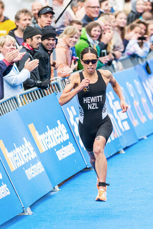 STOCKHOLM - AUG, 23: Andrea Hewitt from New Zeeland running to the finish line in the Womens ITU World Triathlon Series event 23, 2014 in Stockholm, Swedenのeditorial素材