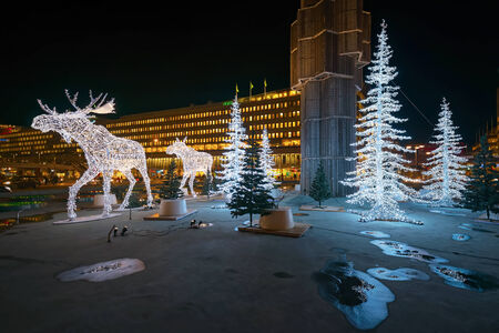 STOCKHOLM - 25 NOV: Christmas decorations in forms of a Moose family in the city centre of Stockholm. 25 November 2014, Sweden. Sergels torg during renovationのeditorial素材