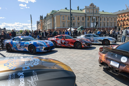 STOCKHOLM, SWEDEN - MAY 23: Gumball 3000 cars at display on the streets of Stockholm on May 23, 2015. People at the streets admiring the exotic cars at display before the start of the 2015 event.のeditorial素材