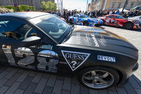 STOCKHOLM, SWEDEN - MAY 23: Gumball 3000 cars at display on the streets of Stockholm on May 23, 2015. People at the streets admiring the exotic cars at display before the start of the 2015 event.のeditorial素材
