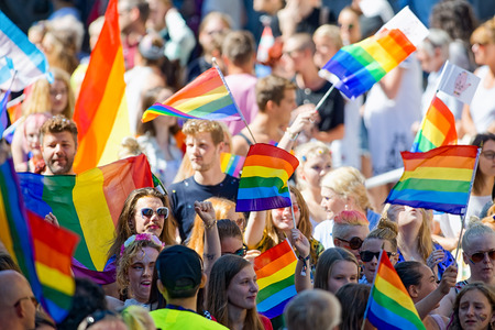 STOCKHOLM, SWEDEN - AUGUST 1, 2015: Rainbow flags at the Pride parade in Stockholm. Approx 400.000...