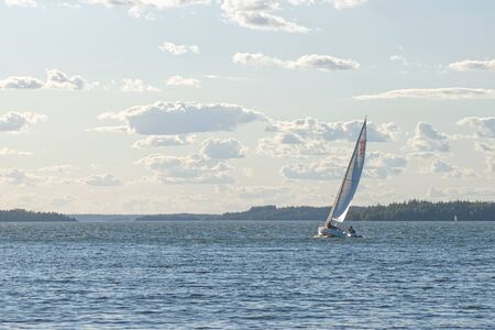 GRISSLEHAMN, SWEDEN - JULY 24, 2015: Sailboat sailing in the windy sunny weather.のeditorial素材