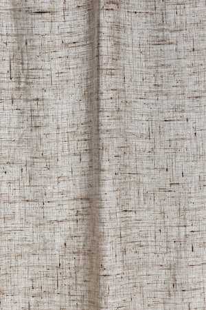 Linen curtain detailed view at window.の写真素材