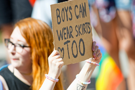 STOCKHOLM, SWEDEN - AUGUST 1, 2015: Sign saying Boys can wear skirts too at the Pride parade in...