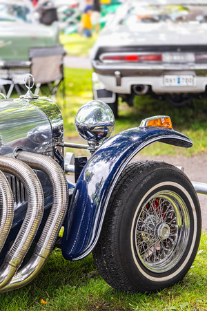 NORRTALJE, SWEDEN - JULY 11, 2015: Front of an Excalibur from the side at an American Car meeting.のeditorial素材