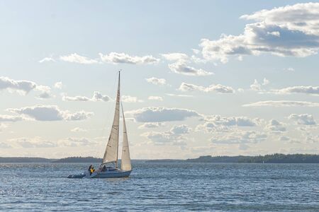 GRISSLEHAMN, SWEDEN - JULY 24, 2015: Sailboat sailing in windy sunny weather.のeditorial素材