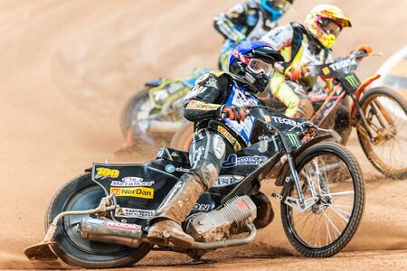 STOCKHOLM - SEPT 26, 2015: Closeup of Andreas Jonsson from Sweden leading a heat at the TEGERA Stockholm FIM Speedway Grand Prix at Friends Arena in Stockholm.のeditorial素材