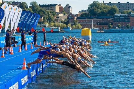 STOCKHOLM, SWEDEN - AUG 22, 2015: Starting grid at the swimming event at the Men's ITU World Triathlon series eventのeditorial素材