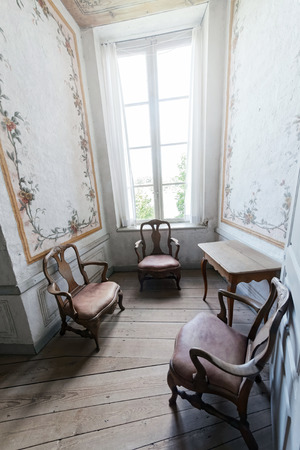 MARIEFRED, SWEDEN - JULY 28, 2015: Indoors chairs at the Gripsholm castle in the idyllic small town of Mariefred.のeditorial素材