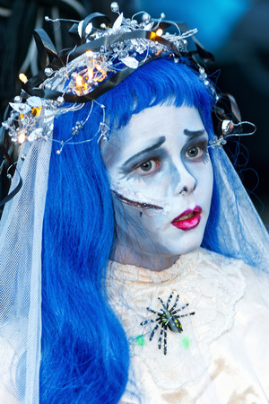 STOCKHOLM, SWEDEN - OCT 31, 2015: Blue haired princess at the Halloween parade Shockholm in Kungstradgardenのeditorial素材