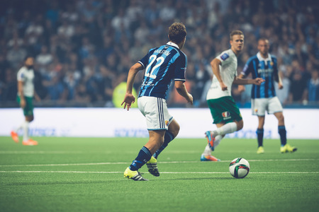 Photo pour STOCKHOLM, SWEDEN - AUG 24, 2015: Jesper Karlstrom (DIF) playing at the soccer game between the rivals Djurgarden and Hammarby at Tele2 arena. - image libre de droit