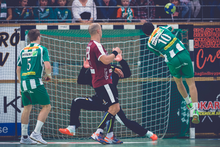 STOCKHOLM, SWEDEN - NOV 4, 2015: Josef Pujol jump shooting at the Handball game between Hammarby vs Lugi at Eriksdalshallen. Allsvenskan Swedish leugueのeditorial素材