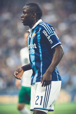 STOCKHOLM, SWEDEN - AUG 24, 2015: Atacker Nyasha Mushekwi (DIF) at the soccer game between the rivals Djurgarden and Hammarby at Tele2 arena.のeditorial素材