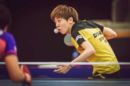 STOCKHOLM, SWEDEN - NOV 15, 2015: Final match in double between Ye, Yihan (SIN) and Meng, Zi (CHI) at the table tennis tournament SOC at the arena Eriksdalshallen.のeditorial素材
