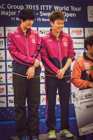 STOCKHOLM, SWEDEN - NOV 15, 2015: Prize cermony for the women double in the table tennis tournament SOC at the arena Eriksdalshallen.のeditorial素材