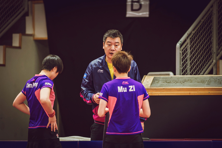 STOCKHOLM, SWEDEN - NOV 15, 2015: Final match in double between Ye, Yihan (SIN) and Meng, Zi (CHI) at the table tennis tournament SOC at the arena Eriksdalshallen.のeditorial素材