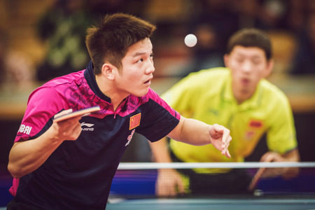 STOCKHOLM, SWEDEN - NOV 15, 2015: Final match in double between Zhendong, Jike (CHI) and Bo, Xin (CHI) at the table tennis tournament SOC at the arena Eriksdalshallen.のeditorial素材