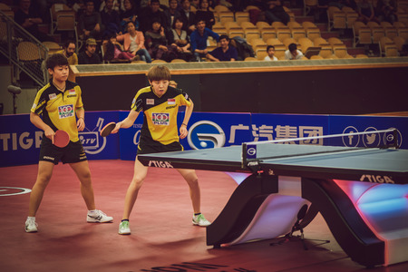STOCKHOLM, SWEDEN - NOV 15, 2015: Final match in double between Ye, Yihan (SIN) and Meng, Zi (CHI) at the table tennis tournament SOC at the arena Eriksdalshallen.のeditorial素材