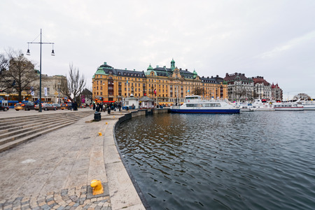 STOCKHOLM, SWEDEN - DEC 27, 2015: Nybrokajen with Dramaten and Strandvagen during winter.のeditorial素材