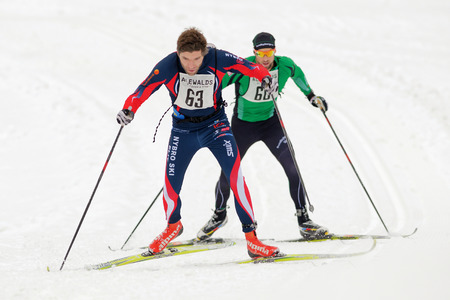 STOCKHOLM, SWEDEN - JAN 24, 2016: Winner Elis Weslien in front of Claes Theander at the Ski Marathon.のeditorial素材