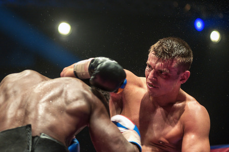 STOCKHOLM, SWEDEN - APRIL 23, 2016: Nordic fight night boxing between Oscar Ahlin (SWE) and Patrick Mendy (UK) Super Middleweight. Mendy wonのeditorial素材