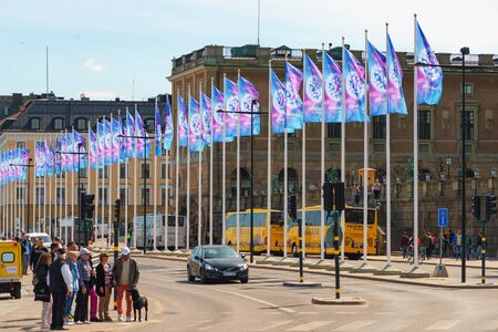 STOCKHOLM, SWEDEN - MAY 13, 2016: Eurovision club with a row of flags at the Royal castle in Stockholm during the ESC week.のeditorial素材