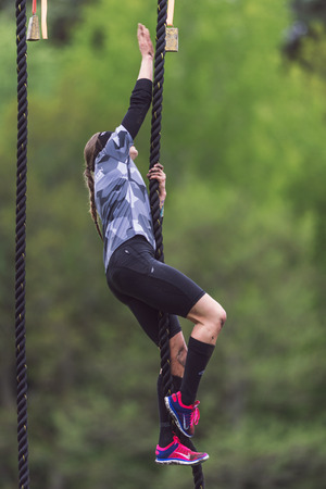STOCKHOLM, SWEDEN - MAY 14, 2016 Tough Viking obstacle course around Stockholm Stadion with the rope climbing obstacle.のeditorial素材