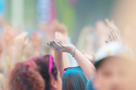 STOCKHOLM, SWEDEN - MAY 22, 2016: Hands in the air at Color Run Tropicolor world tour in Stockholm.のeditorial素材