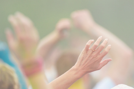 STOCKHOLM, SWEDEN - MAY 22, 2016: Hands waving at Color Run Tropicolor world tour in Stockholmのeditorial素材