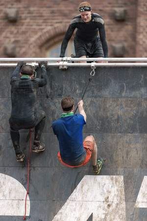 STOCKHOLM, SWEDEN - MAY 14, 2016 Climbing at Tough Viking obstacle course around Stockholm Stadion.のeditorial素材