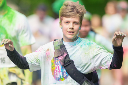 STOCKHOLM, SWEDEN - MAY 22, 2016: Boy between the color stations at Color Run Tropicolor world tour...