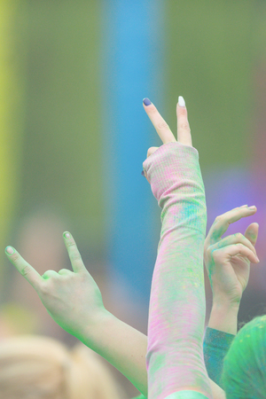 STOCKHOLM, SWEDEN - MAY 22, 2016: Hands in the air at Color Run Tropicolor world tour in Stockholm.のeditorial素材