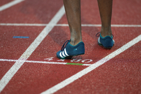 STOCKHOLM, SWEDEN - JUNE 16, 2016: Shoe of an athlete sprinter on a track and field start at the IAAF Diamond League in Stockholm.のeditorial素材