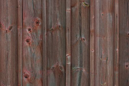 Dark red painted planks outside of a barn. Swedenのeditorial素材