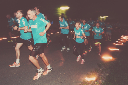 STOCKHOLM, SWEDEN - AUG 13, 2016: Runners at the Midnight run in Stockholm (Midnattsloppet). Filter appliedのeditorial素材