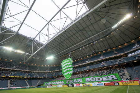 SOLNA, SWEDEN - AUG 28, 2016: Soccer derby between AIK and Hammarby in Allsvenskan at Friends arena. Visibility due to smoke wasnt that good the first half.のeditorial素材